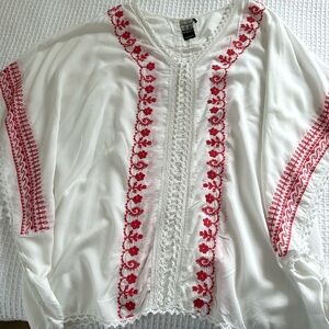 Embroidered white top, size M.